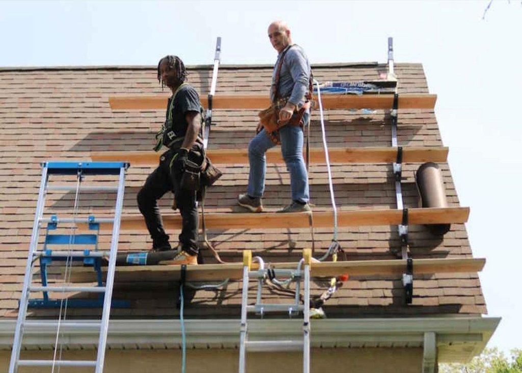 W Contracting roofing crew at work